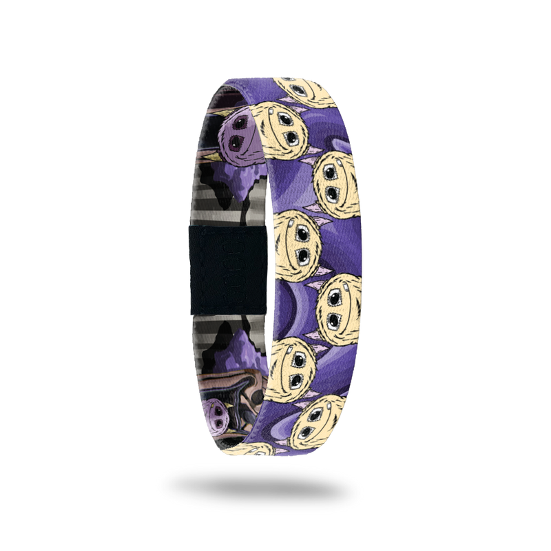 Product photo of the outside of 2020 - Day 2 - Purple Pete: purple design with repeating pale yellow monster with horns and one tooth