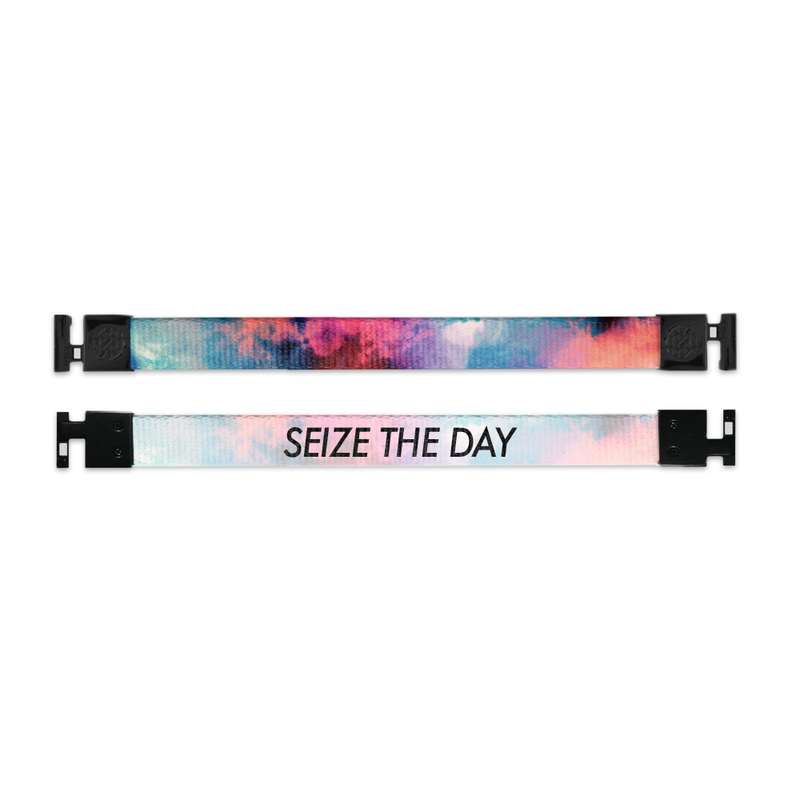 Shows outside and inside design for Seize The Day imperial with black aglet clasps. Top is the outside design, a layering of transparent colors of blue, pink, purple, and orange. Bottom is the inside design, with a white background and Seize The Day centered in black text