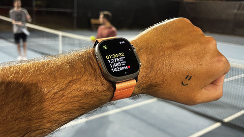 Apple Watch Ultra Band Sports with workout tracker information and sweaty wrist. 1,200 calories burned in 90 minutes.