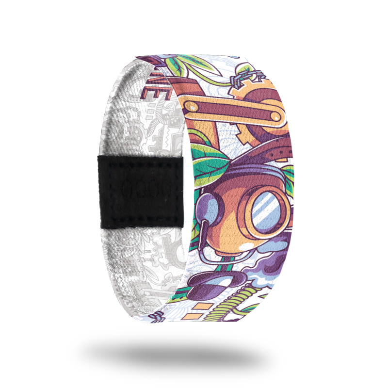 Outside design of elastic wristband called There Can Only Be One. The design is a bunch of random items such as a helmet, a plant, gears, a hat, coils and other items. The colors are mainly orange, green, and purple