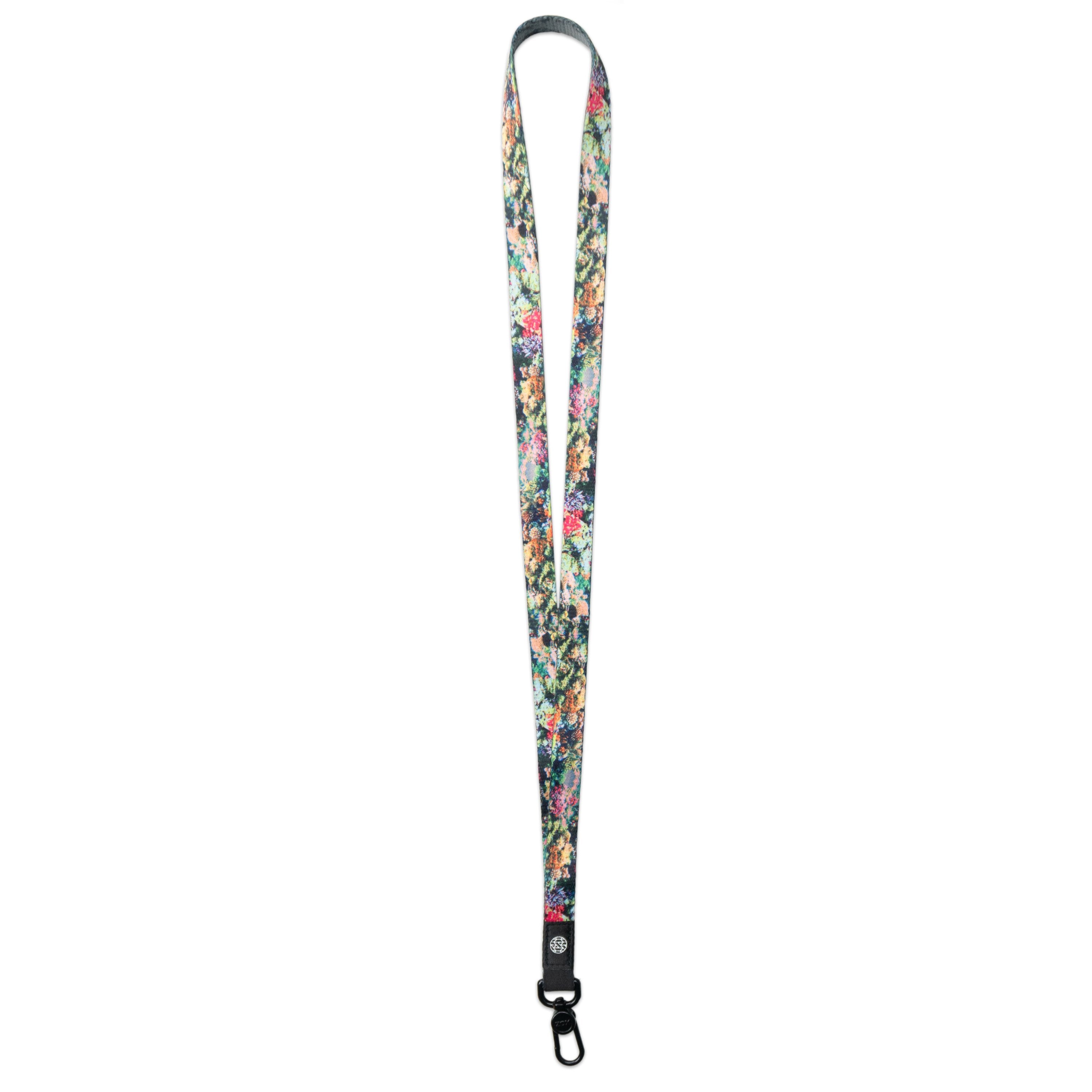 A product image of a ZOX lanyard showing the front of the design with a black colored metal clip. The lanyard is called Stronger With Every Struggle and the design is a photo of a coral reef that has different shades of green, pink, blue, purple and orange 
