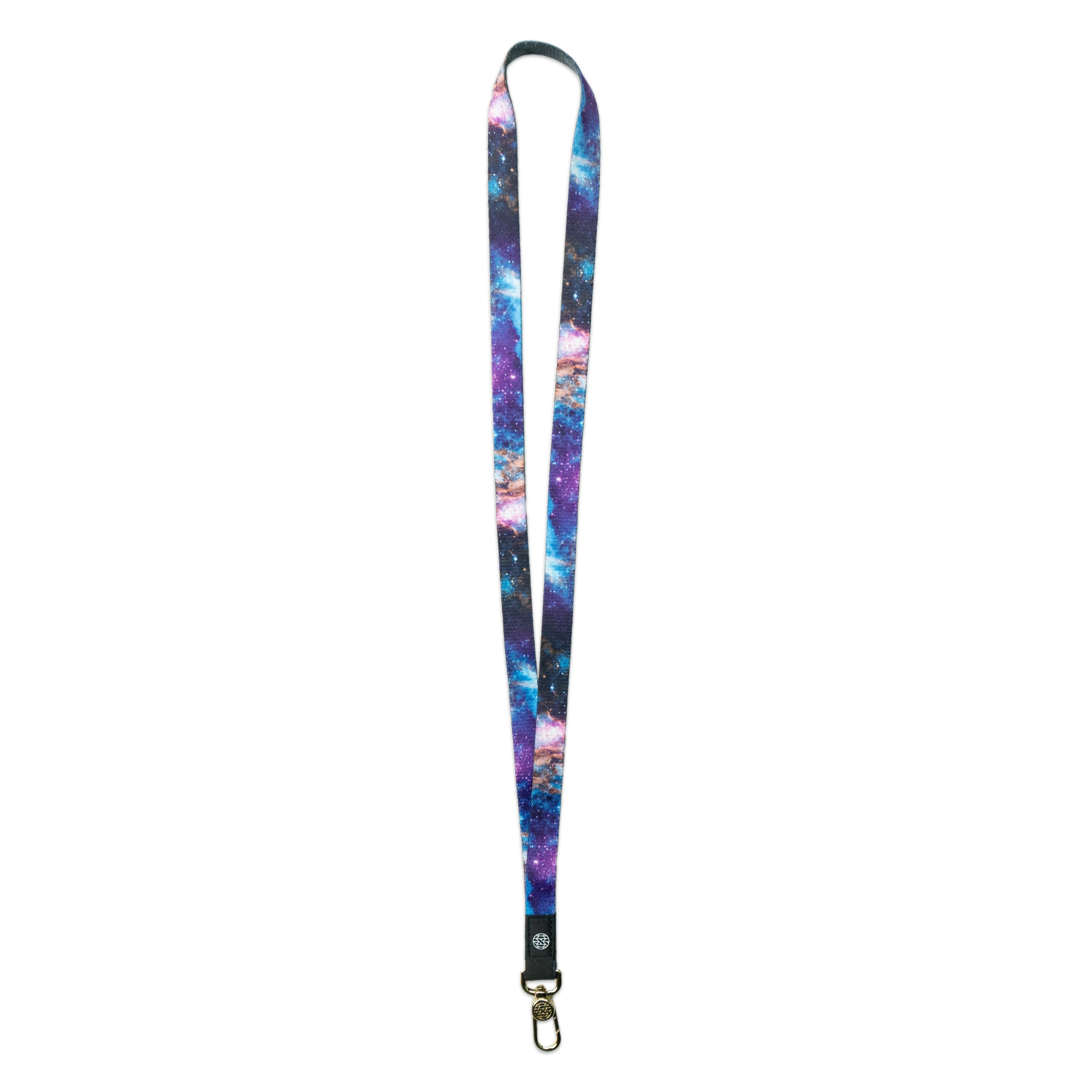 A product image of a ZOX lanyard showing the front of the design with a black colored metal clip. The lanyard is called Fighter and the design is an image of a nebula in space that is a mix of purple hues as well as some blue and pink colors mixed in.