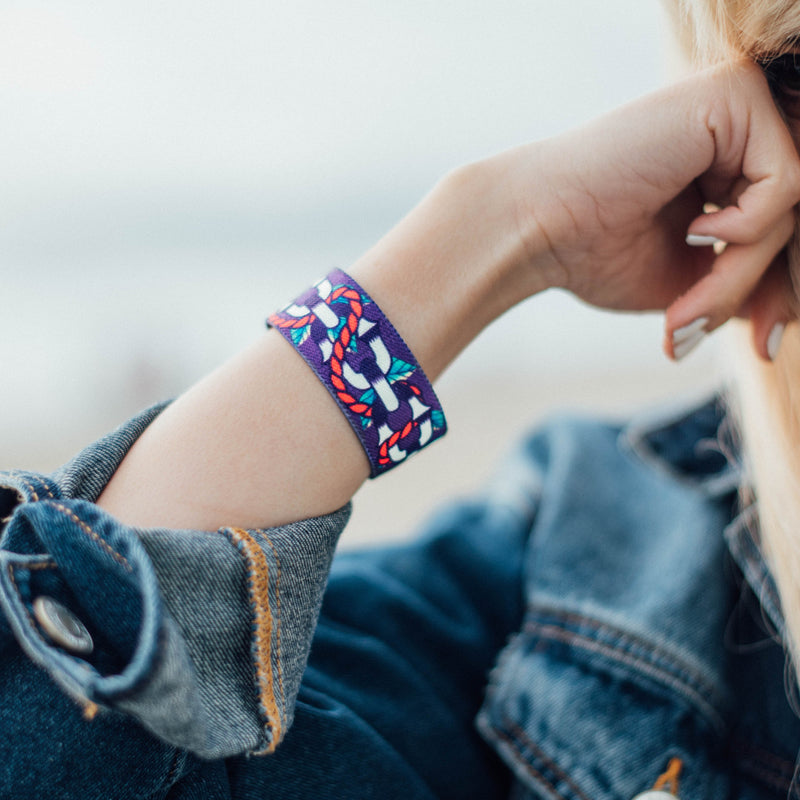 Lifestyle image close up of Unbroken on model's wrist