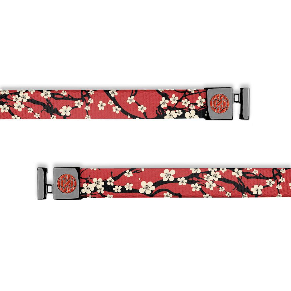 Red string base with white cherry blossoms all over. Has gunmetal aglets with a red ZOX logo. 