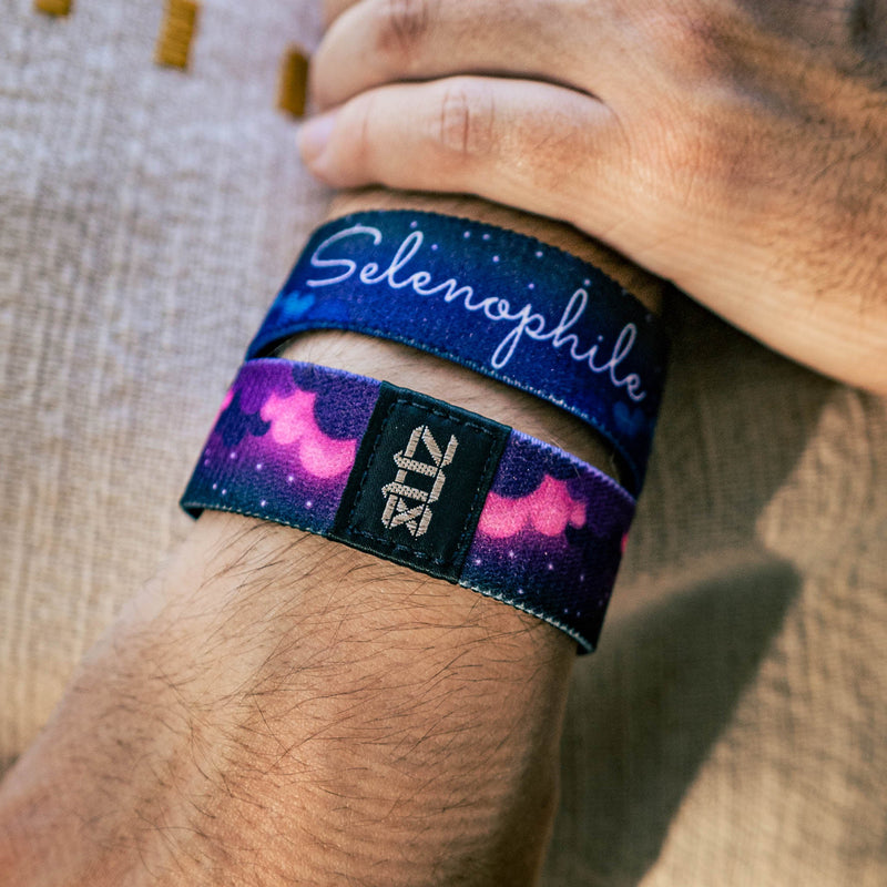 Lifestyle image of close up of 2 Selenophile straps on wrist