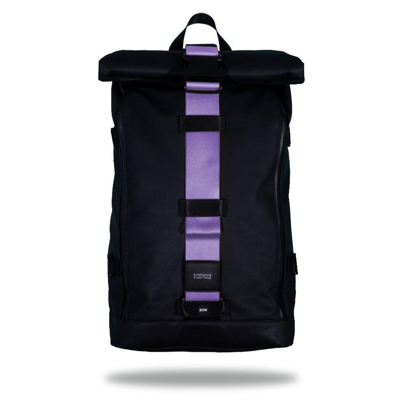 Product image of an Imperial backpack showing a wide strap down the center of it that is interchangeable. The closure strap the item that is for sale on this page and is called Grape Wave and is a sold lighter purple color