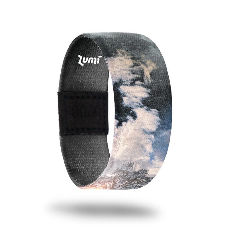 Be Here Now-Sold Out-ZOX - This item is sold out and will not be restocked. A realistic image of a tree with the sunrise/sunset and blue skies with clouds. Inside is all black and reads Be Here Now.  