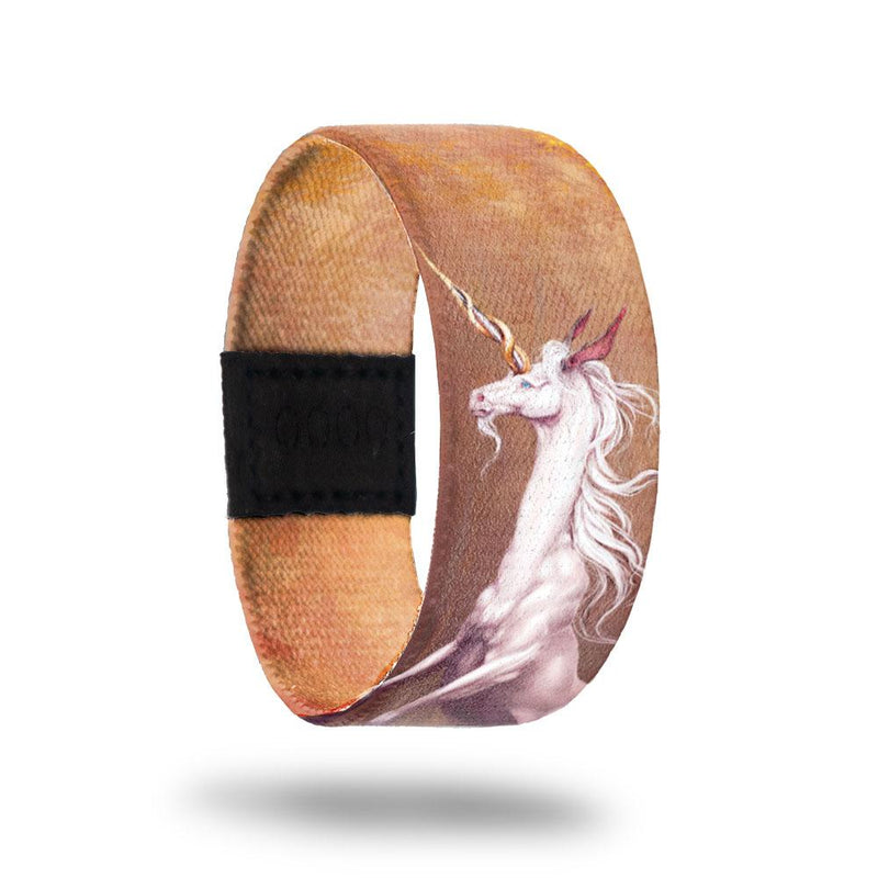 Believe In Magic-Sold Out-ZOX - This item is sold out and will not be restocked. Light brown strap with a white unicorn. Inside is solid brown and says Believe In Magic. 