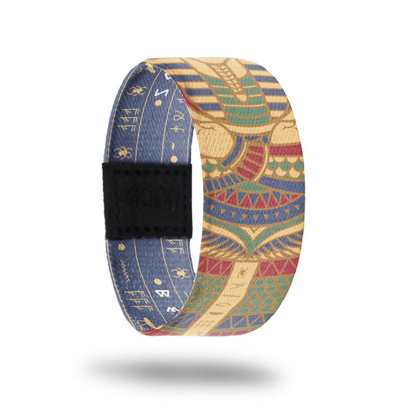 Beneath The Sands-Sold Out-ZOX - This item is sold out and will not be restocked. Egyptian scene of a Pharaoh's burial dress. Muted red, green, blue and yellow. Inside is muted blue with hieroglyphics all over and reads Beneath The Sands.  