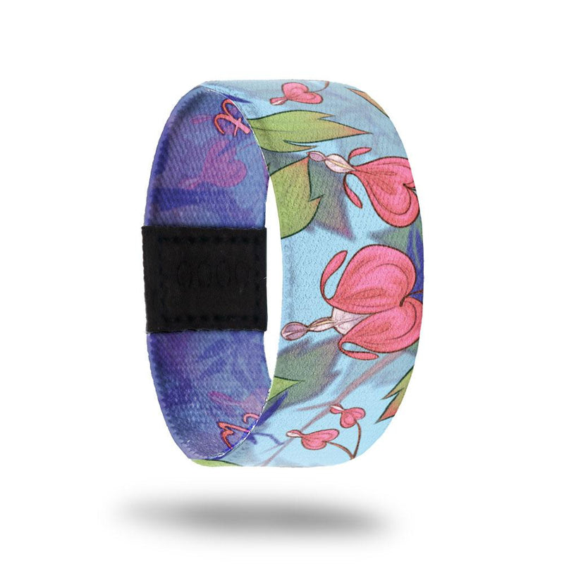 Bleeding Heart-Sold Out-ZOX - This item is sold out and will not be restocked. Base is sky blue with pink flowers all over. Inside is blue and purple and reads Bleeding Heart. 
