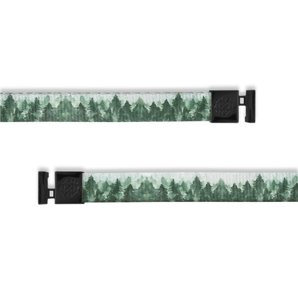 A product image of a wide and flat string with black metal aglets meant to be used with the ZOX hoodie. The string is called Happy Trees and is a design of painted trees that are green with a lighter grey sky.