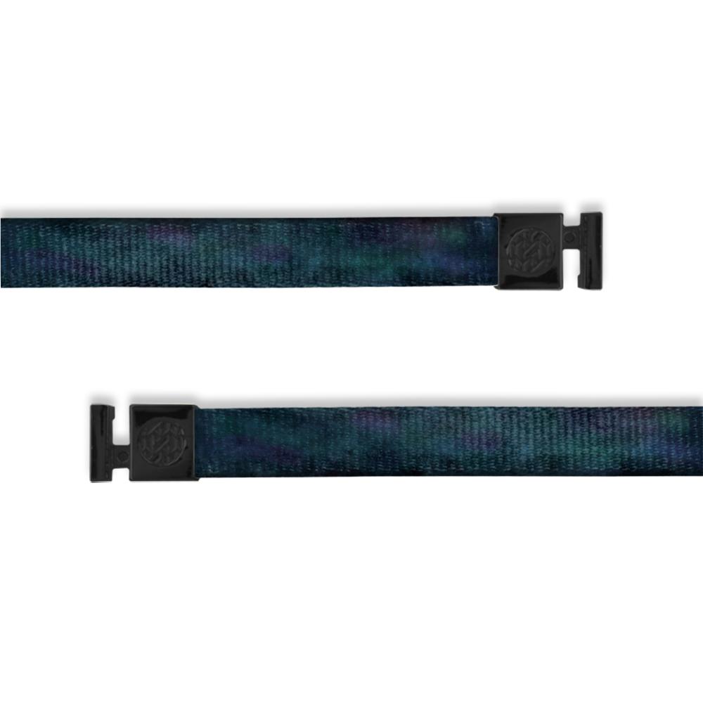 A product image of a wide and flat string with black metal aglets meant to be used with the ZOX hoodie. The string is called Milky Way. The design is a very dark blue and black watercolor to imitate the milky way galaxy