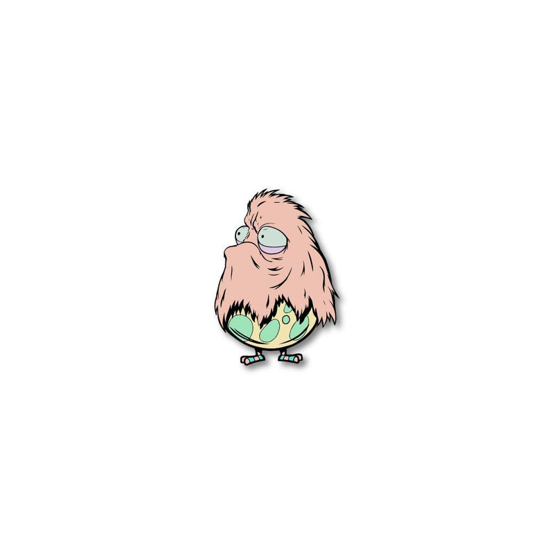 Enamel pin photo for 2020 - Day 31 - Edna Egg-Legs: furry, peach monster inside a yellow and green egg-shell