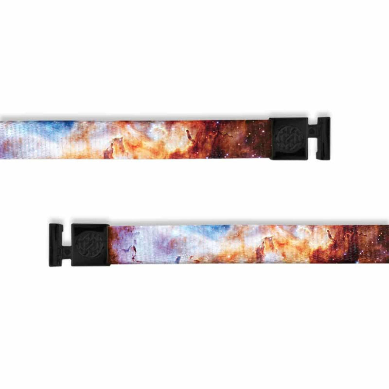 A product image of a wide and flat string with black metal aglets meant to be used with the ZOX hoodie. The string is called Westerlund. The design is a photo from the hubble telescope and is a mix of colors such as pink, blue, orange, red, and brown