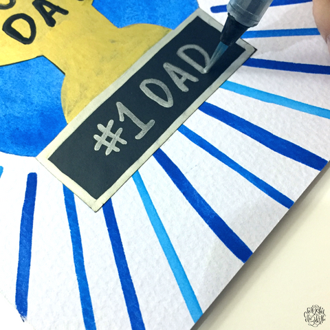 writing number one dad with kassa metallic chalk marker silver color