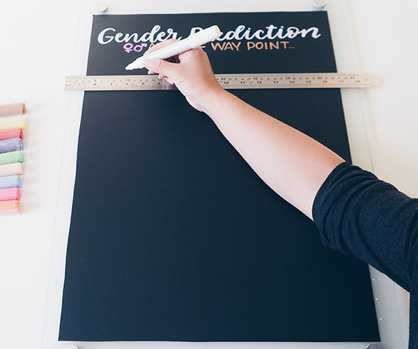 Writing on Chalkboard using the white Kassa chalk marker