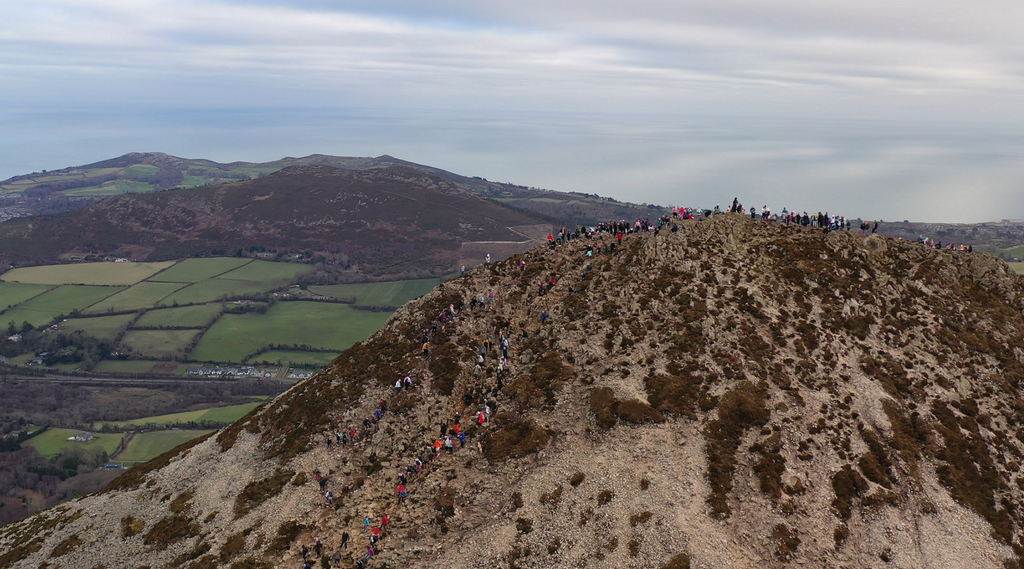 The G+C community celebrating their hike to the top of the Sugarloaf Mountain and pledging their goals for 2022 in the goals box.