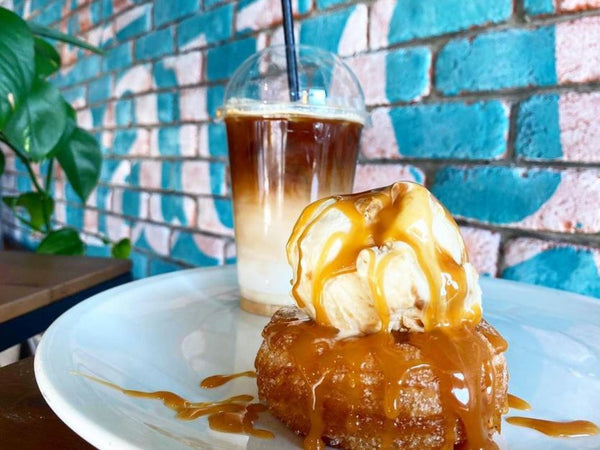 An iced latté and sweet treat at Café Mauds in Belfast