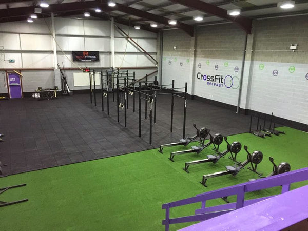 A view of the full CrossFit gym area including open space and gym equipment.