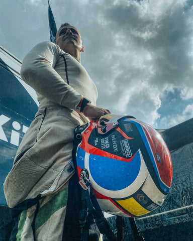 Árón Taylor-Smith in racing attire ahead of a BTCC race.