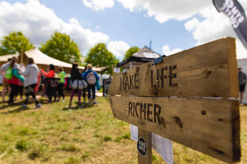 Gym+Coffee Make Life Richer Sign at G+C Clubhouse Wellfest 2019