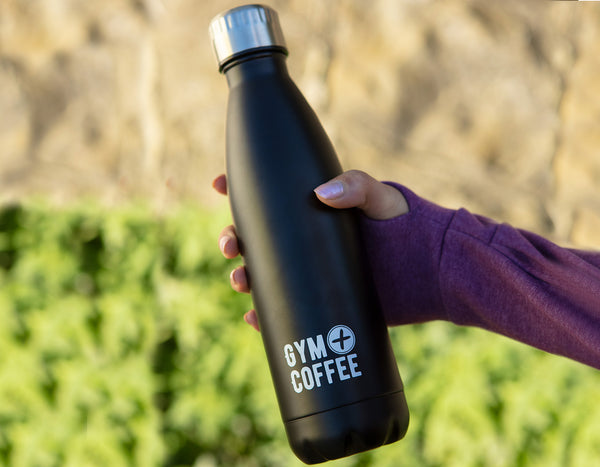 Stainless-steel-waterbottle-gym-plus-coffee-resuable-waterbottle-held-by-woman