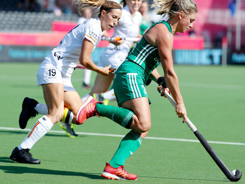 Irish Women's Hockey player Chloe Watkins dribbles the ball on a hockey pitch