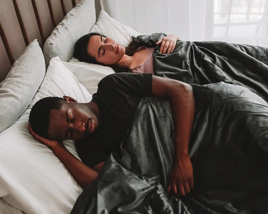couple sleep in bed