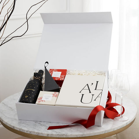Indulge in Our Merry Holidays Gift Box: A Blend of Shiraz, Elegant Glassware, and Sweet Nibbles for the Perfect Festive Celebration