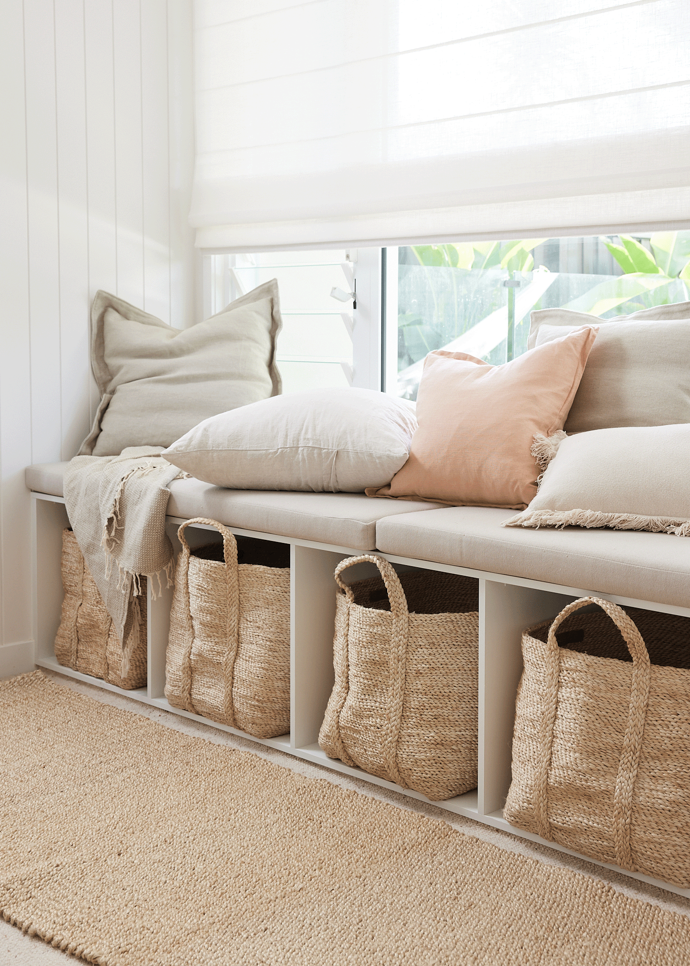 jute baskets in under bench storage in kids bedroom