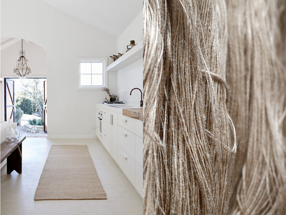 Fair trade jute runner placed in a white kitchen. A close up shot of natural fibres haning, ready to be woven.