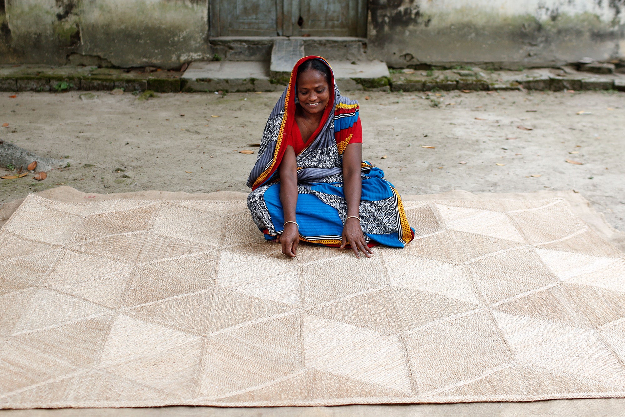 The Dharma Door Fair Trade rug artisan