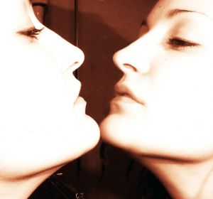 21187_playing_with_the_mirror Anti Aging Makeup tips