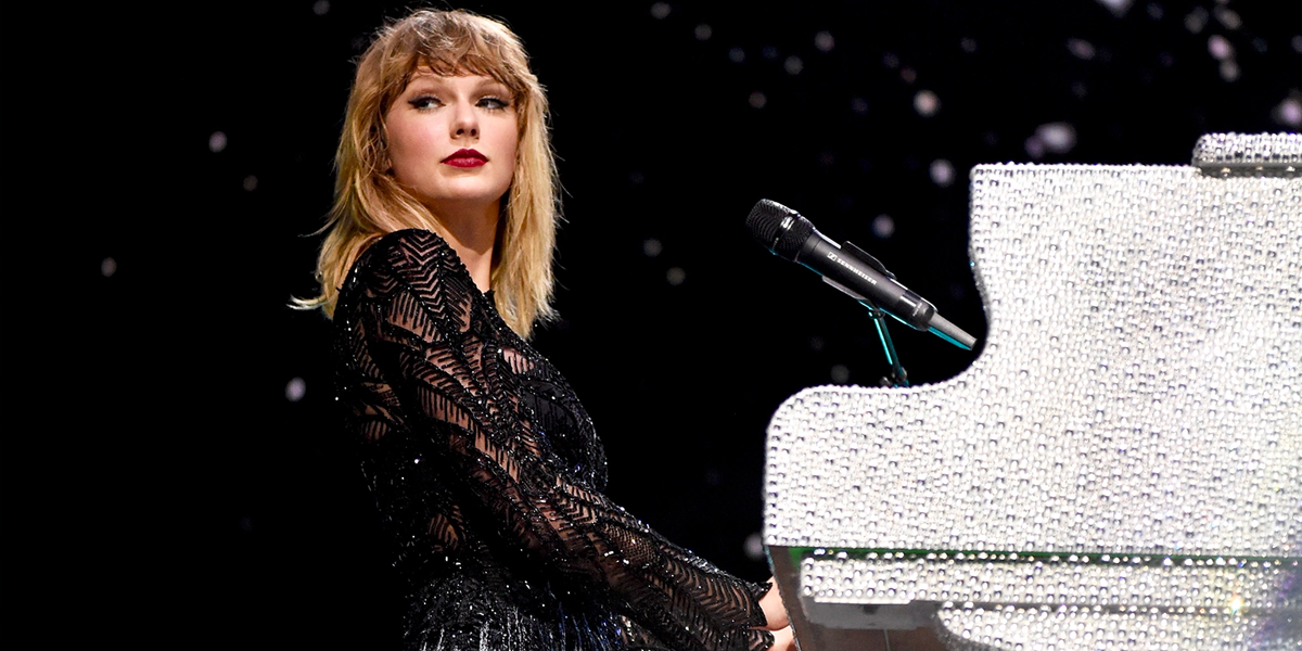 Taylor Swift performing at her Reputation Stadium Tour in 2018