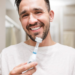 Man-With-Triple-Bristle-Sonic-Toothbrush