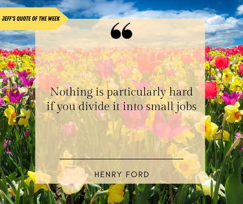 Background of a beautiful, vast field of yellow and pink flowers; Transparent yellow square sits on top of floral background: Quotation marks at the very top of the square, a line at the bottom of the square, the name Henry Ford underneath the line, text in the middle of the square is a quote reading "Nothing is particularly hard if you divide it into small jobs", a quote by Henry Ford.