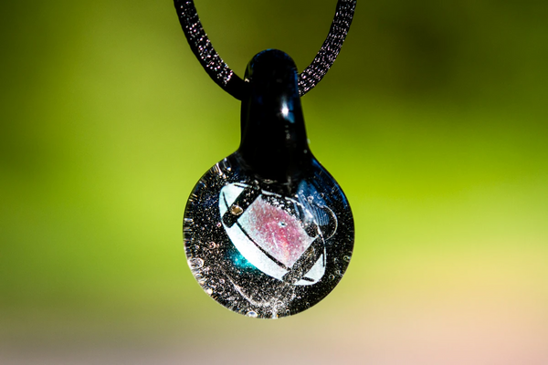 football pendant with cremation ash for men