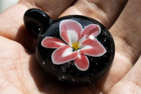 flower touchstone with cremation ash