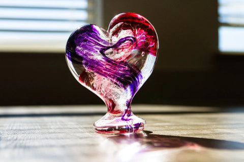 standing glass heart with ash