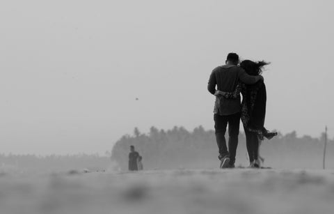 Ear Pain in Cold Weather Two Adults Walking in Snow