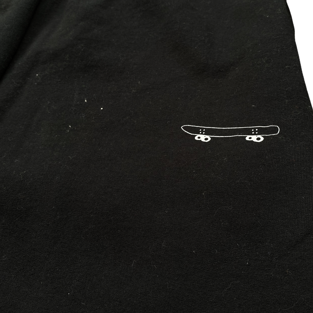 Skateboard black sweatpants iced out font design