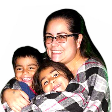 Psychology professor Leslie Martinez hugging two young children
