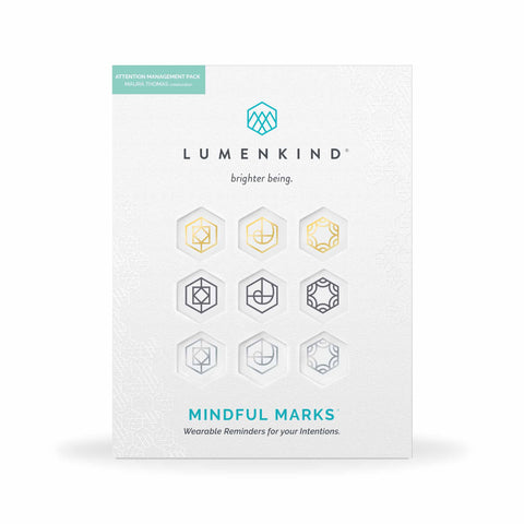 The front side of a pack of Mindful Marks — Attention Management Pack, wearable reminders for your intentions.
