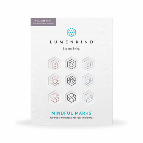 The front side of a pack of Mindful Marks — The Source Pack, wearable reminders for your intentions.