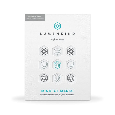 The front side of a pack of Mindful Marks — Upgrade Pack, wearable reminders for your intentions.