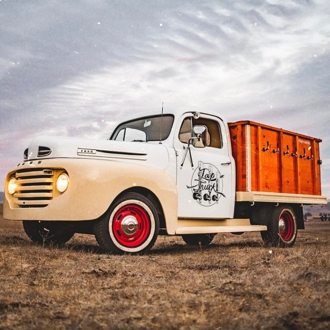 Tap Truck Buffalo's beautiful white truck with racing stripes