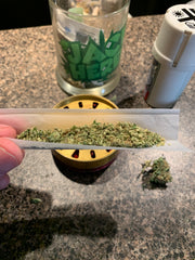 Rolling a joint Weed Grinder Herb Marijuana Cannabis Shell Shock Edmonton Canada
