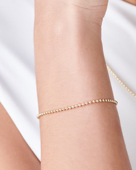 The Slim Designer Clip Lock Bangle in Solid Gold – Flecked with Gold