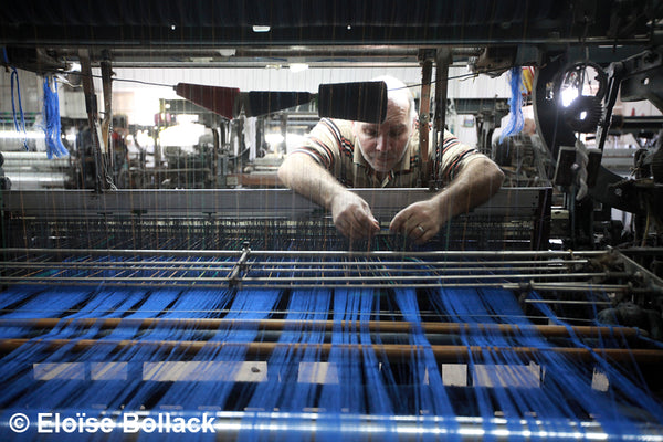 man working in the hirbawi keffiyeh factory