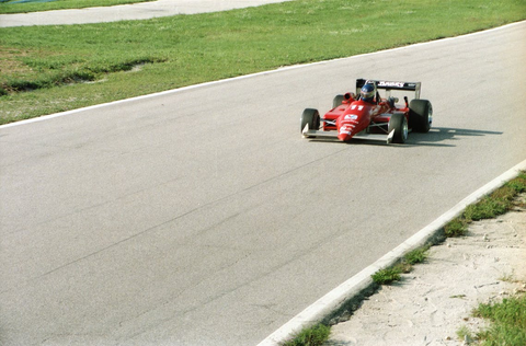 a red car on a racetrack